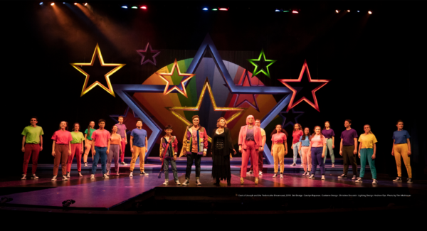 Cast of Joseph and the Technicolor Dreamcoat, 2019. Set Design: Carolyn Rapanos. Costume Design: Christina Sinosich. Lighting Design: Andrew Pye. Photo by Tim Matheson